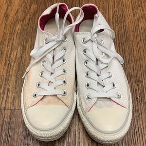 White Converse with gray stripe and pink inside